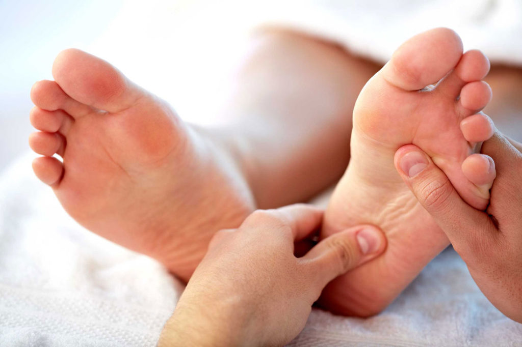 Why are diabetics prone to foot ulcers?